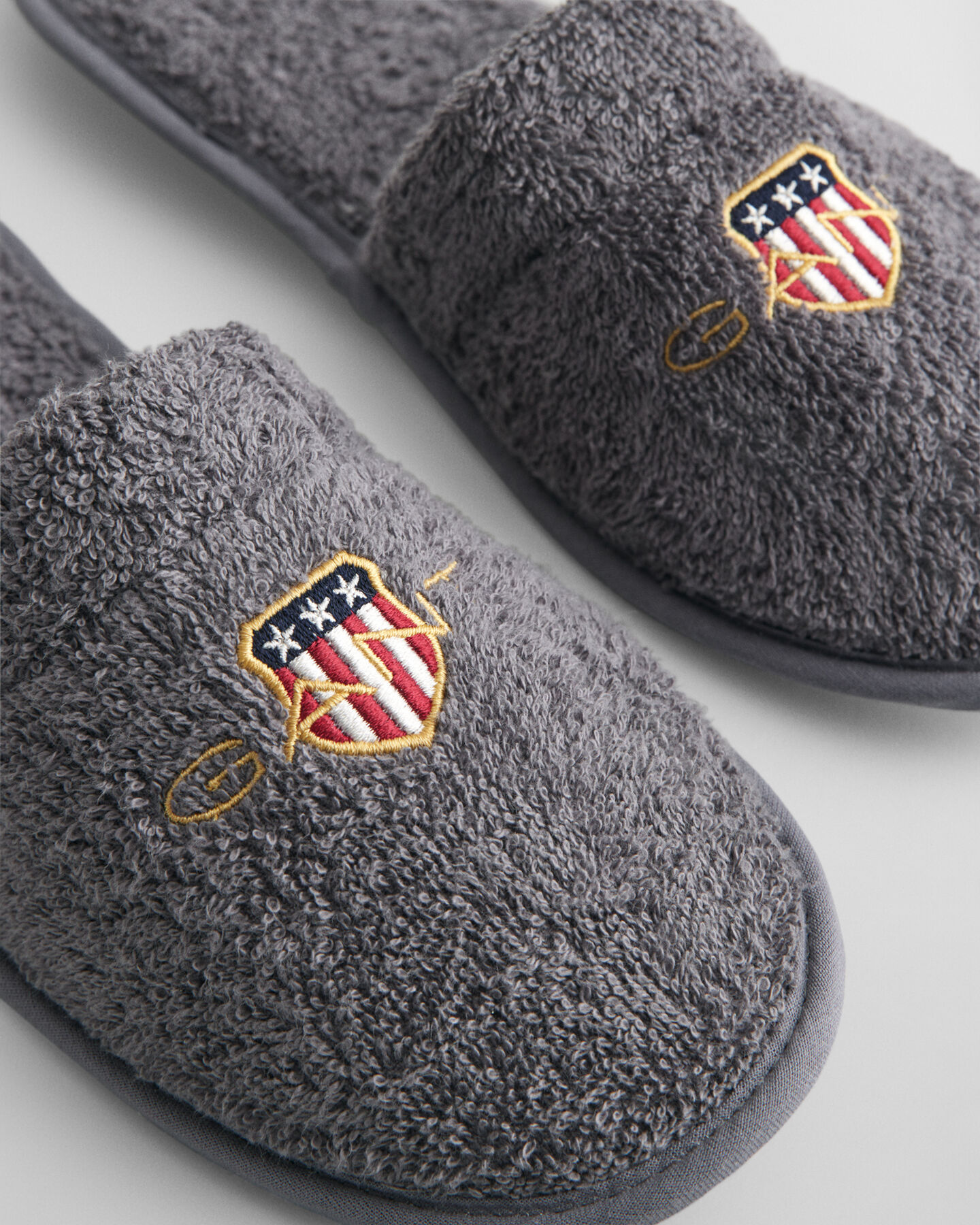 Archive Shield tofflor i frotté