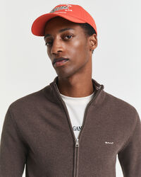 Kofta i bomullspiké med dragkedja