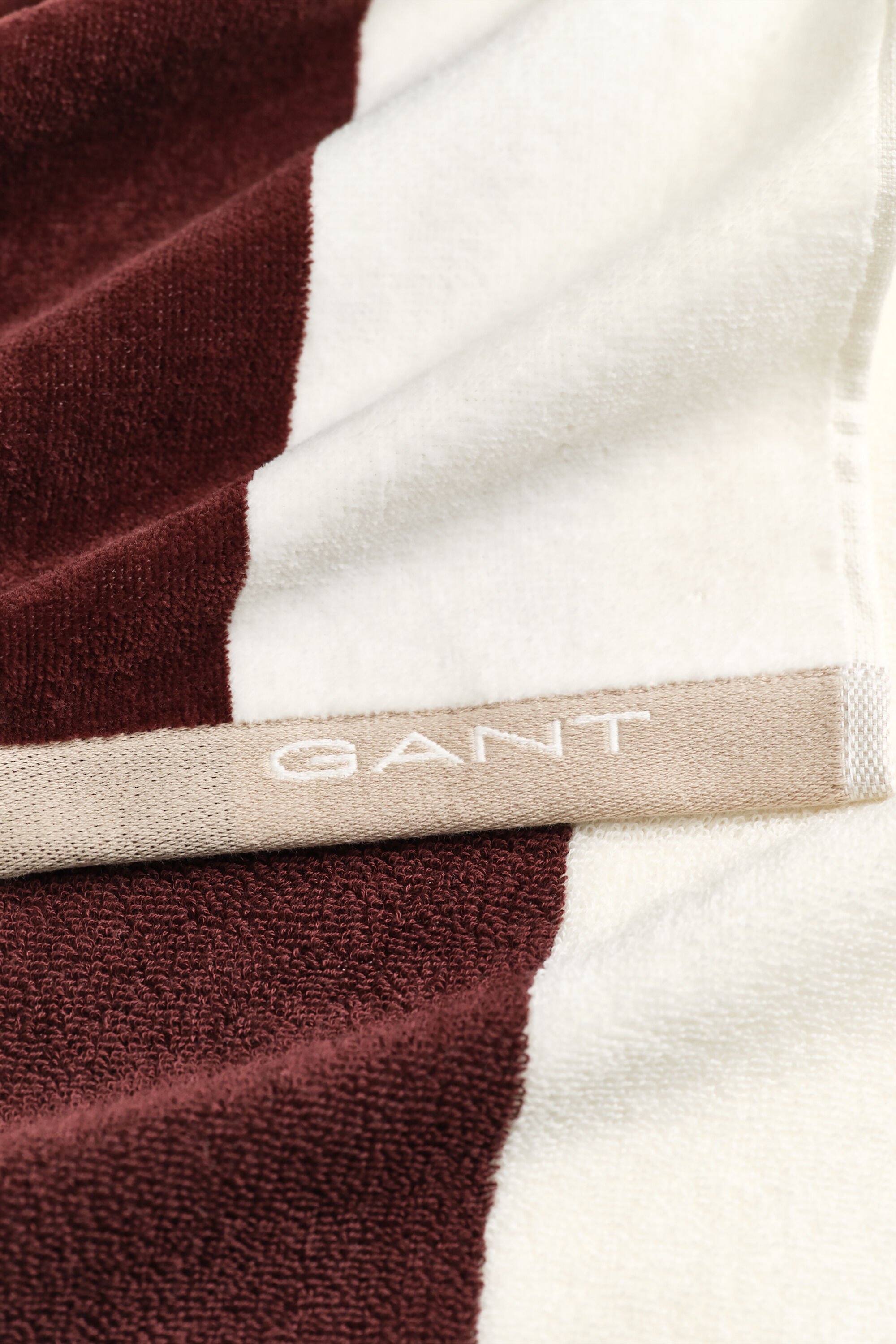 Bredrandig strandhandduk