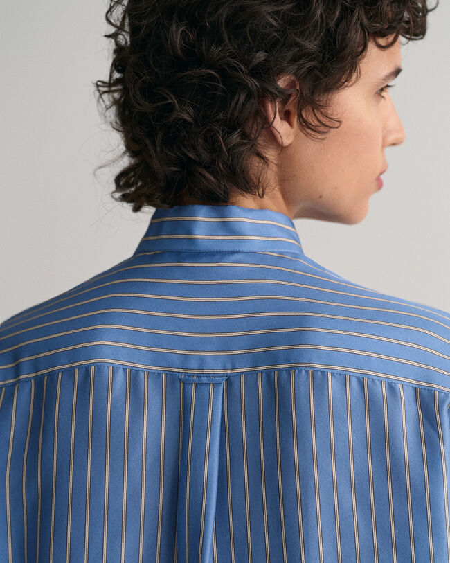 Randig knytblus i siden