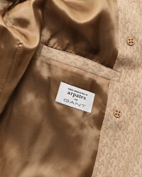 Trenchcoat i jacquard med monogram