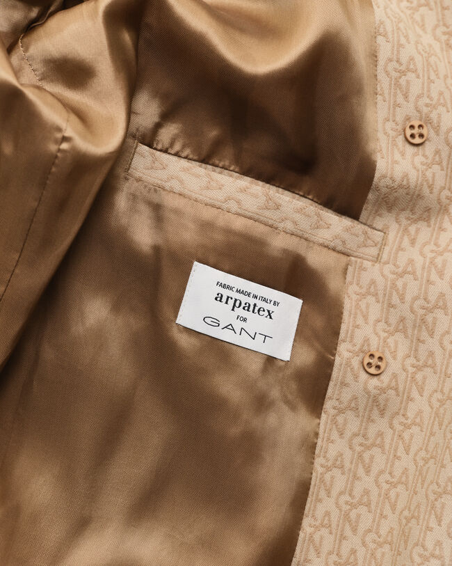 Trenchcoat i jacquard med monogram