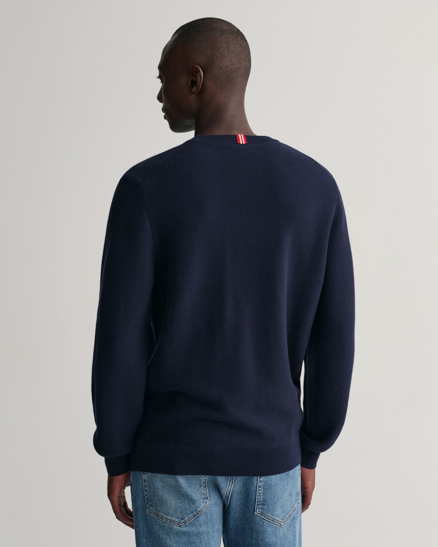 Tunnstickad crew neck tröja