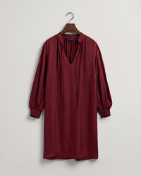 Klänning med ståkrage