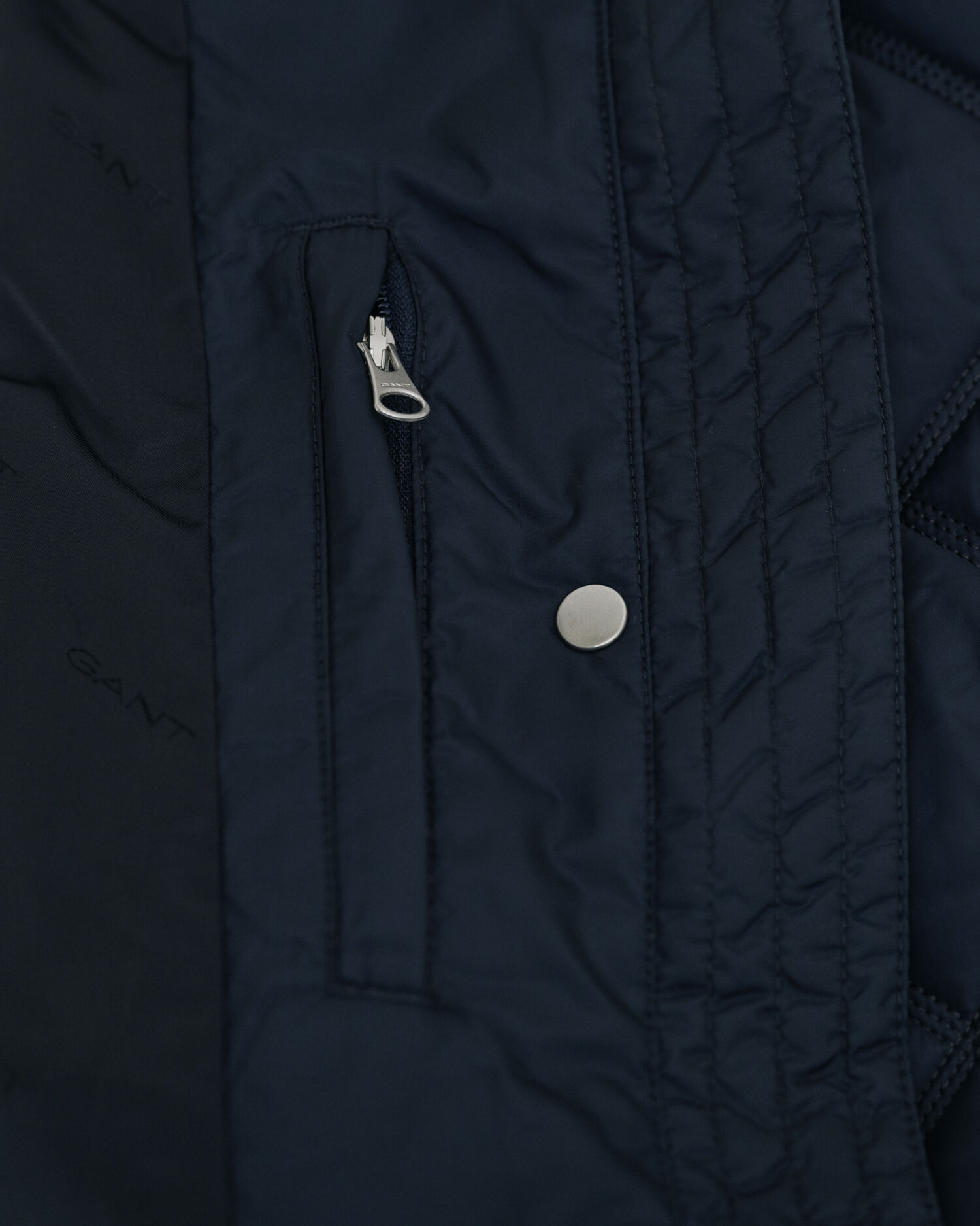 Quiltad kappa med manchesterdetaljer