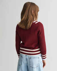 V-ringad kofta med kontrastdetaljer