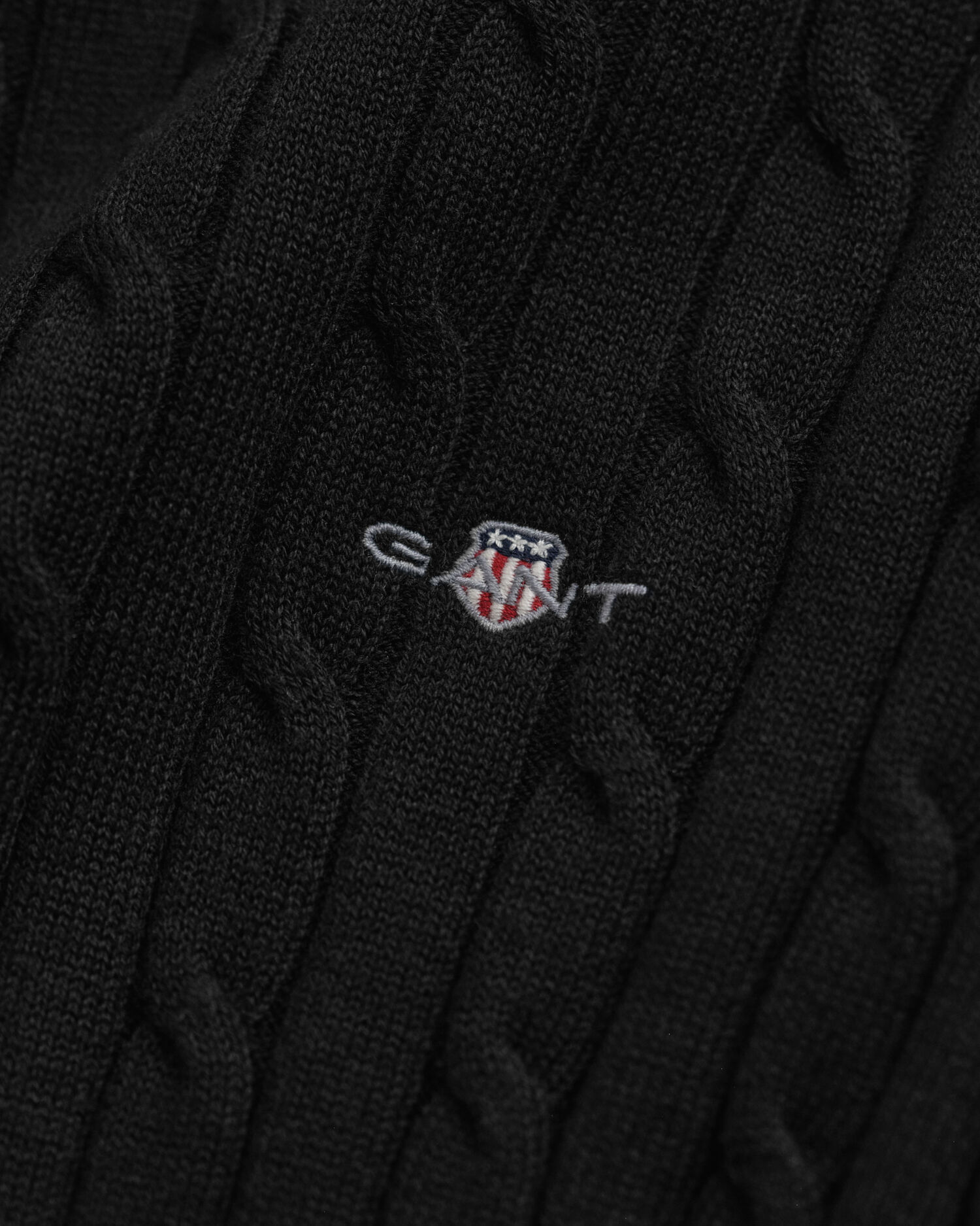 Kabelstickad tröja med rund hals