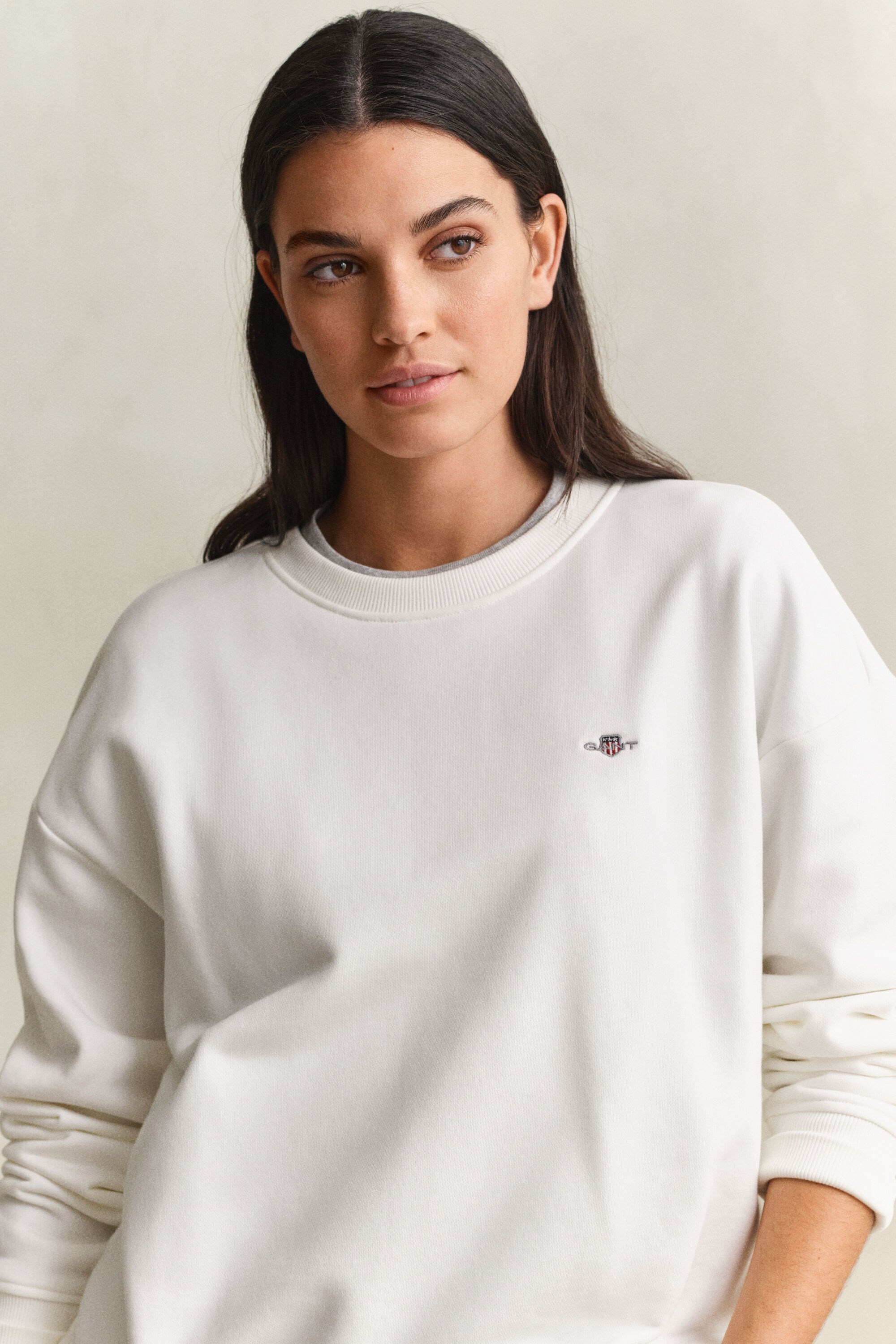 Sweatshirt med sköldemblem