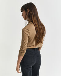 Långärmad sömlös pikétröja med knappar