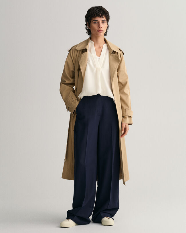 Ärmlös blus med ståkrage