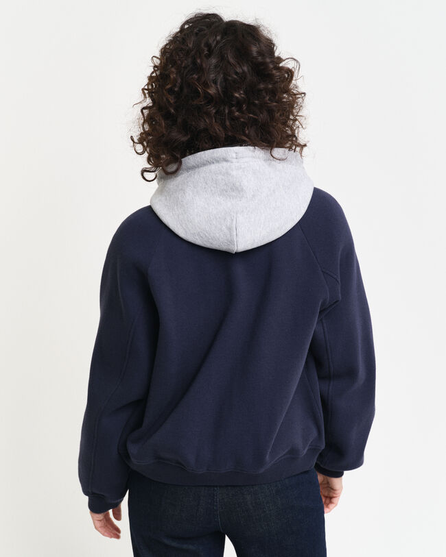 Collegejacka i jersey med G-märke