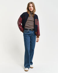 Randig ribbstickad polotröja med lång ärm