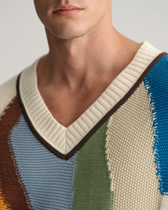 Stickad slipover med konsttryck