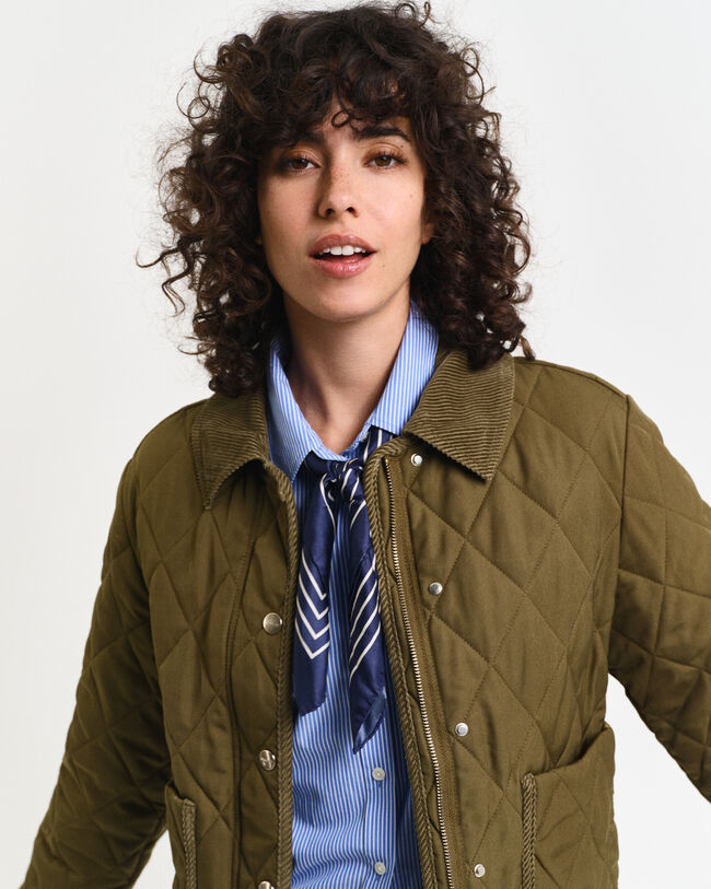 Quiltad jacka med manchesterdetaljer