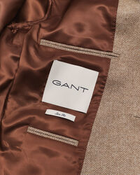 Kostymkavaj med fiskbensmönster