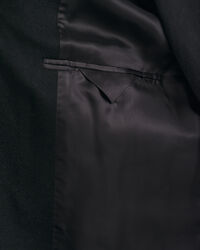 Klassisk figursydd ytterrock i ull