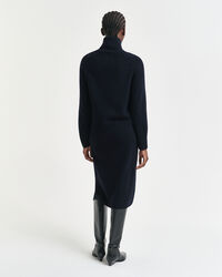 Klänning med polokrage och stickade detaljer