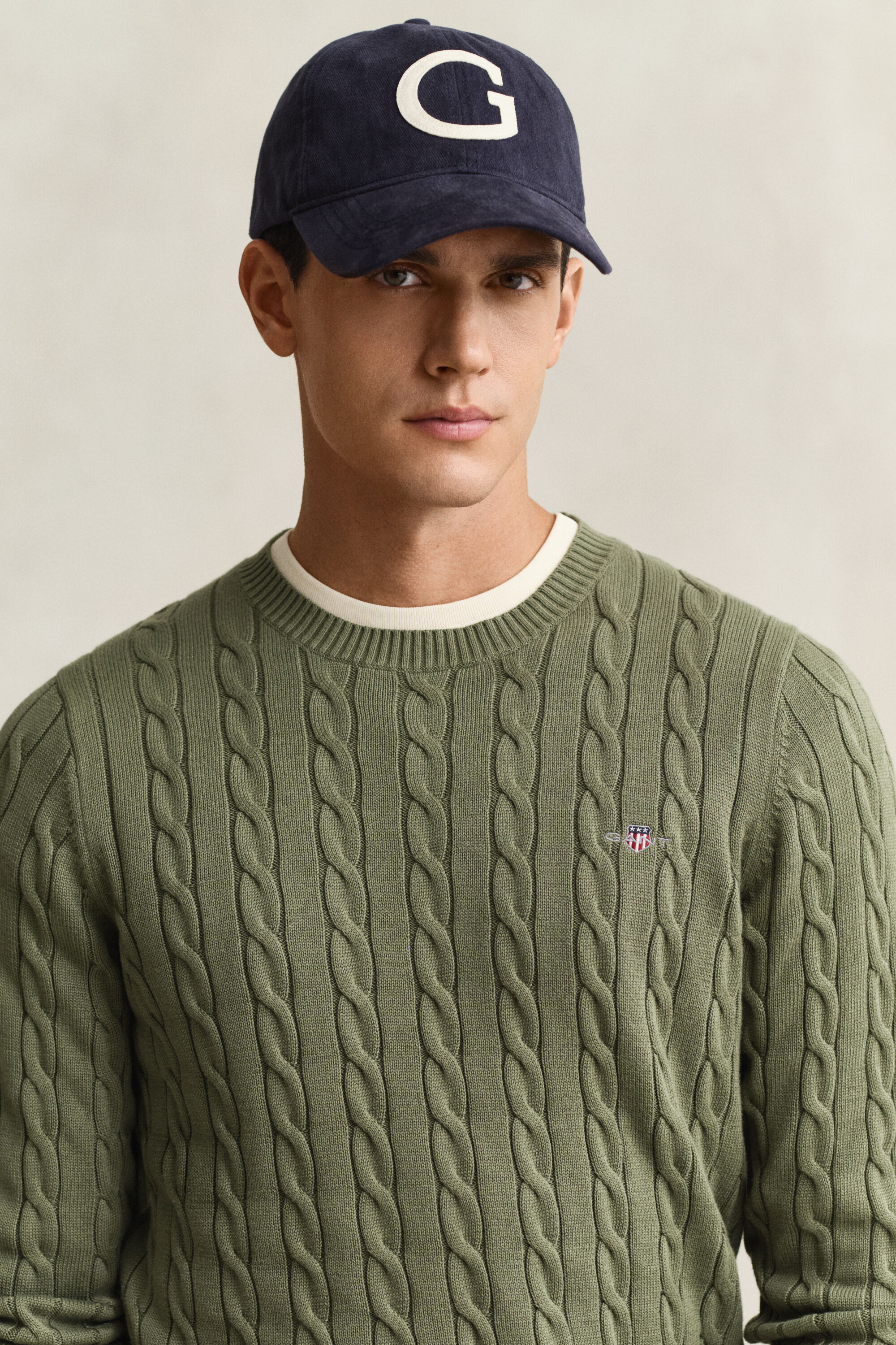 Kabelstickad bomullströja med rund hals