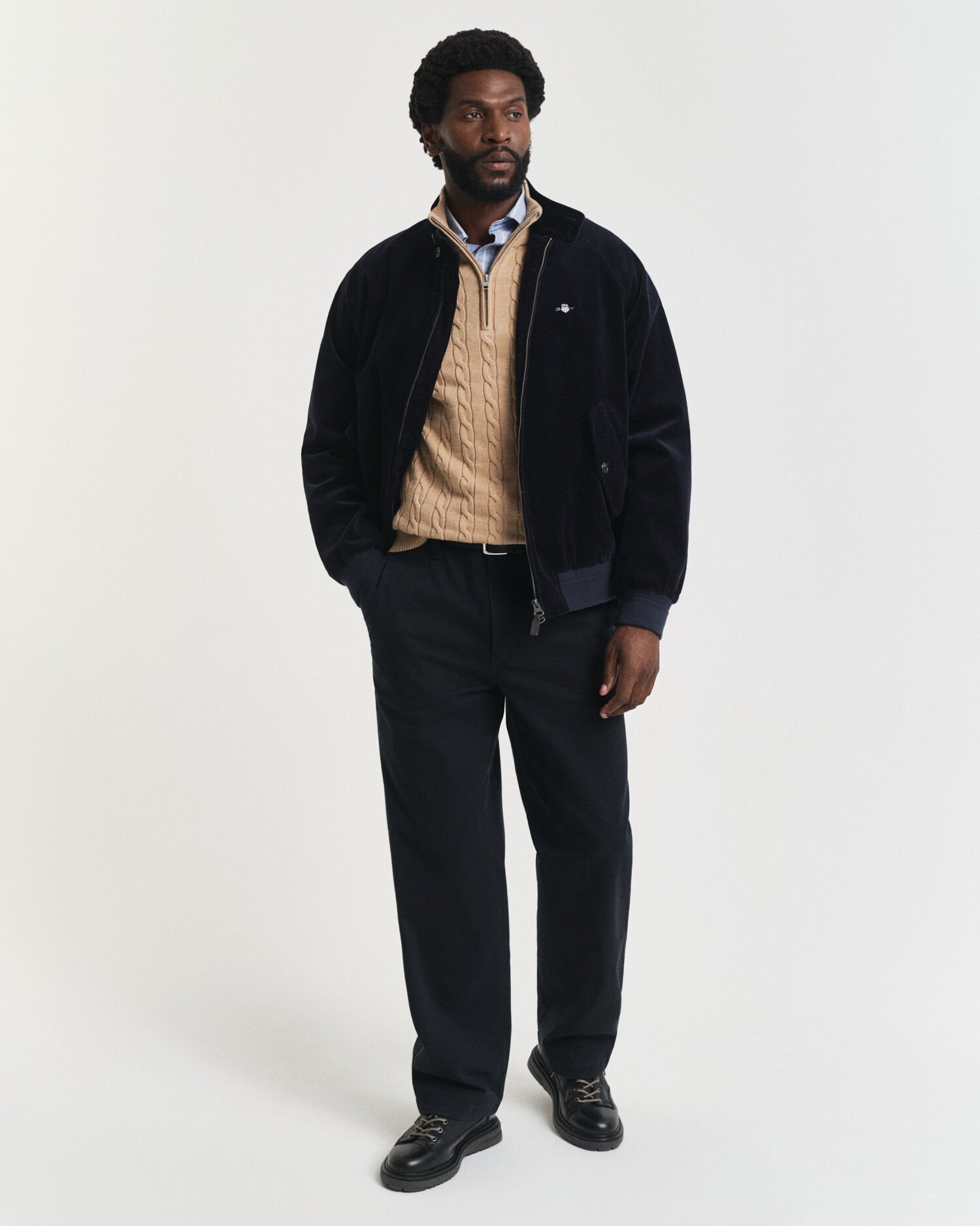 Kabelstickad bomullströja med dragkedja vid halsöppningen