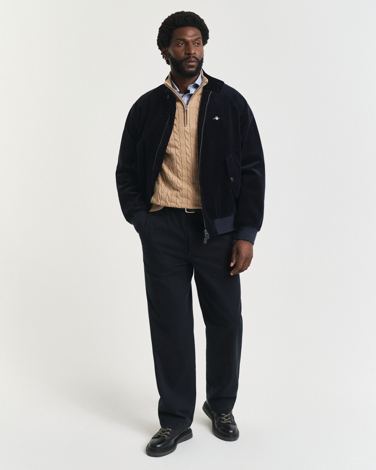 Kabelstickad bomullströja med dragkedja vid halsöppningen