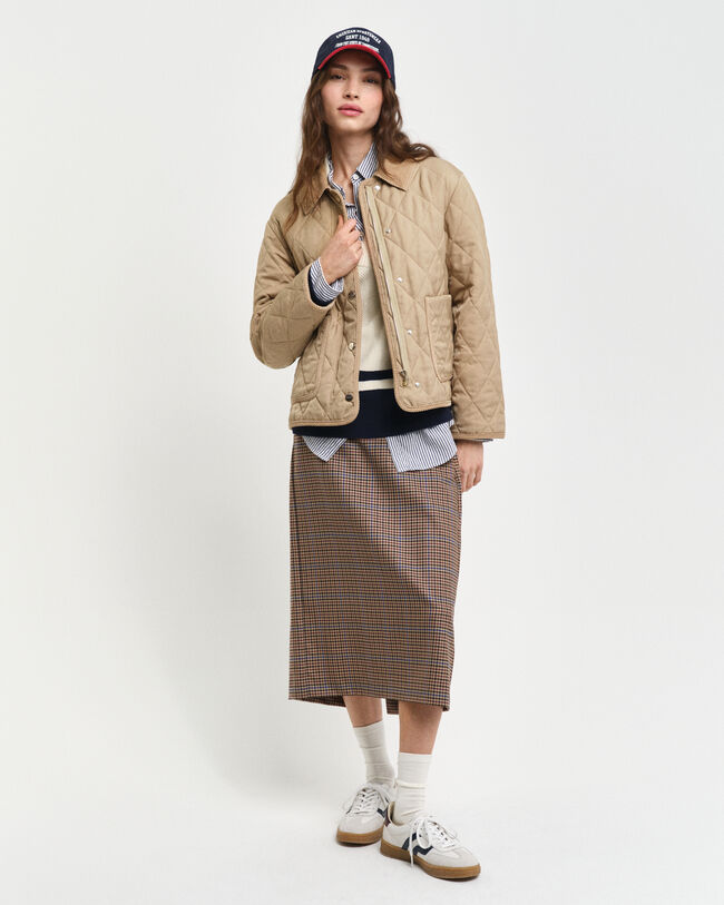 Quiltad jacka med manchesterdetaljer