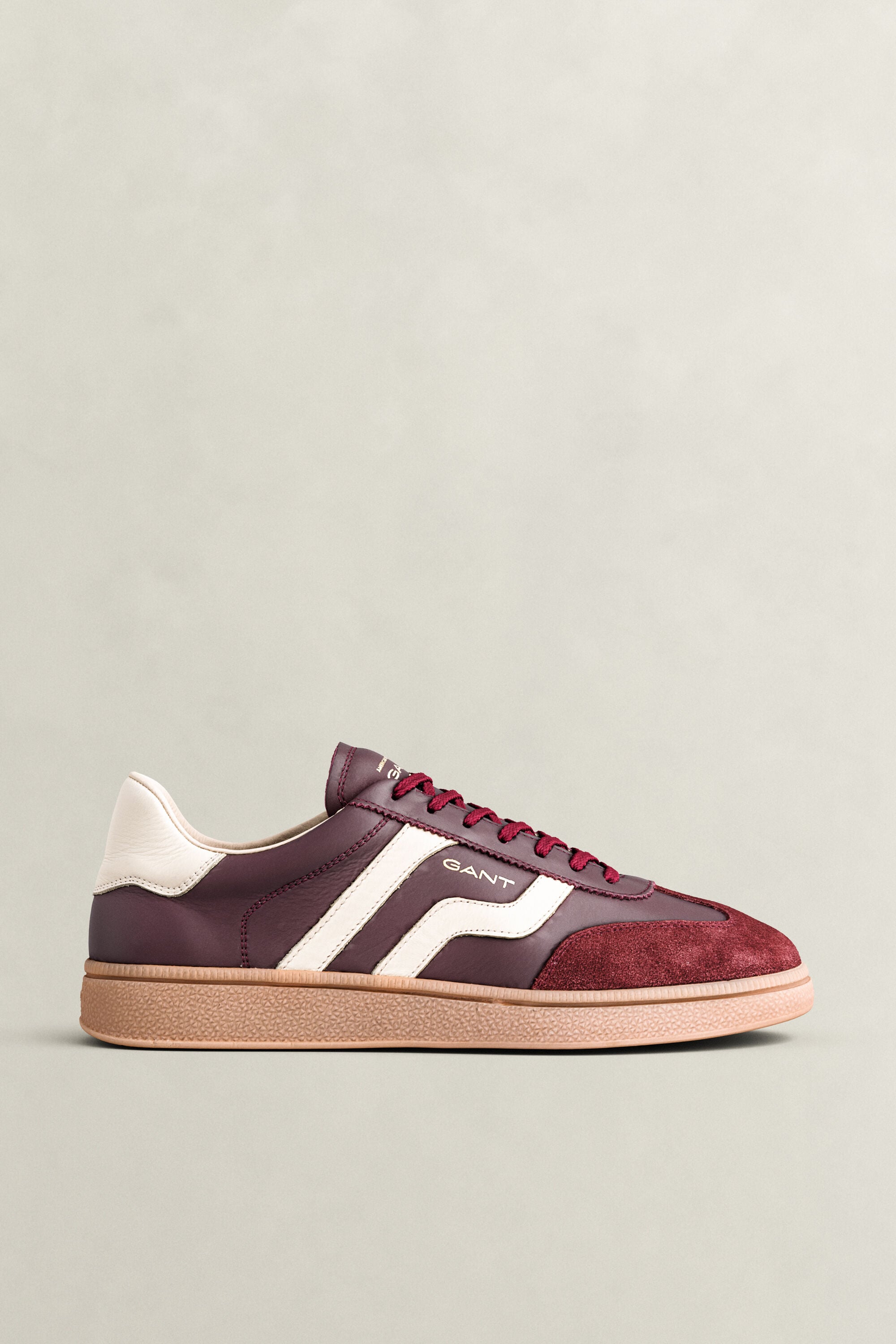 Cuzmo sneakers i läder och mocka