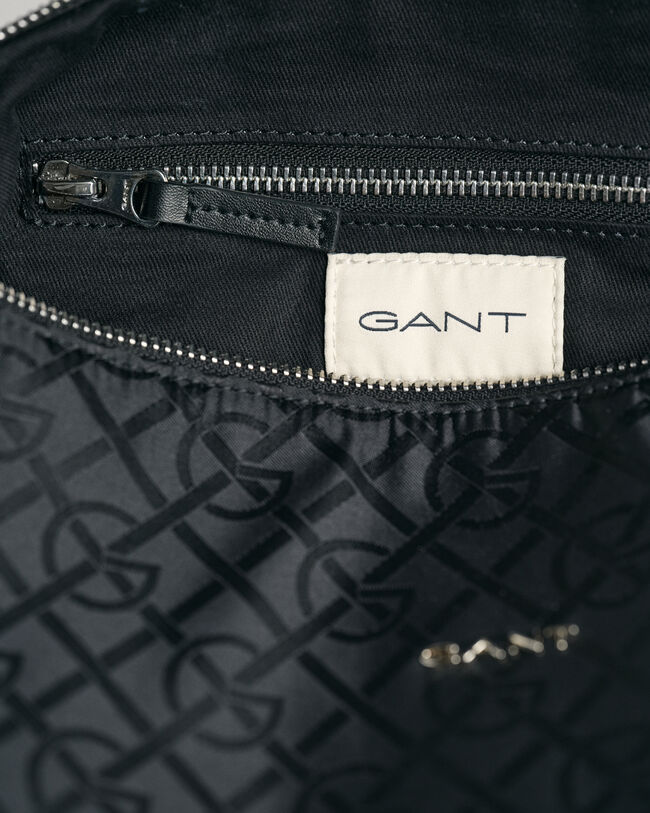 G-mönstrad axelväska