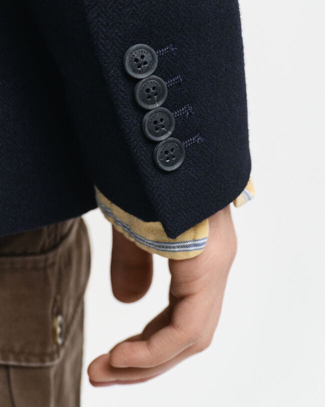 Kostymkavaj med fiskbensmönster