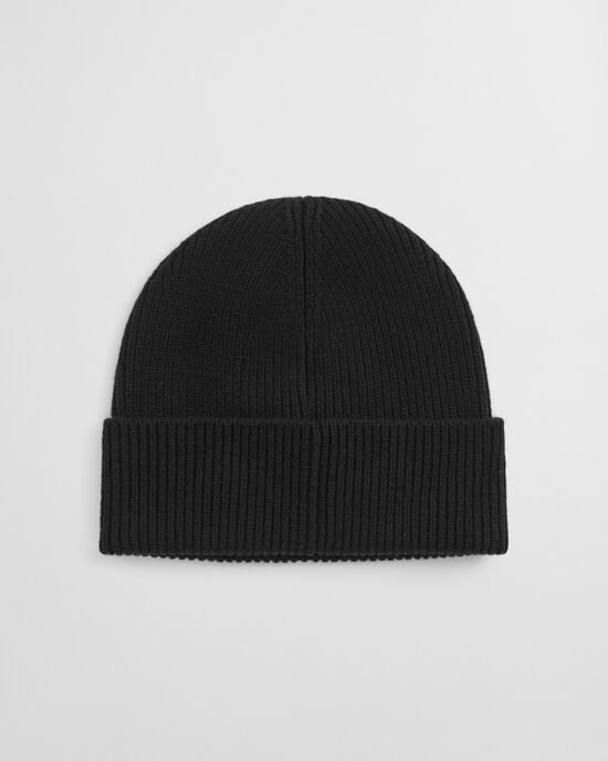 Ribbstickad mössa i ull