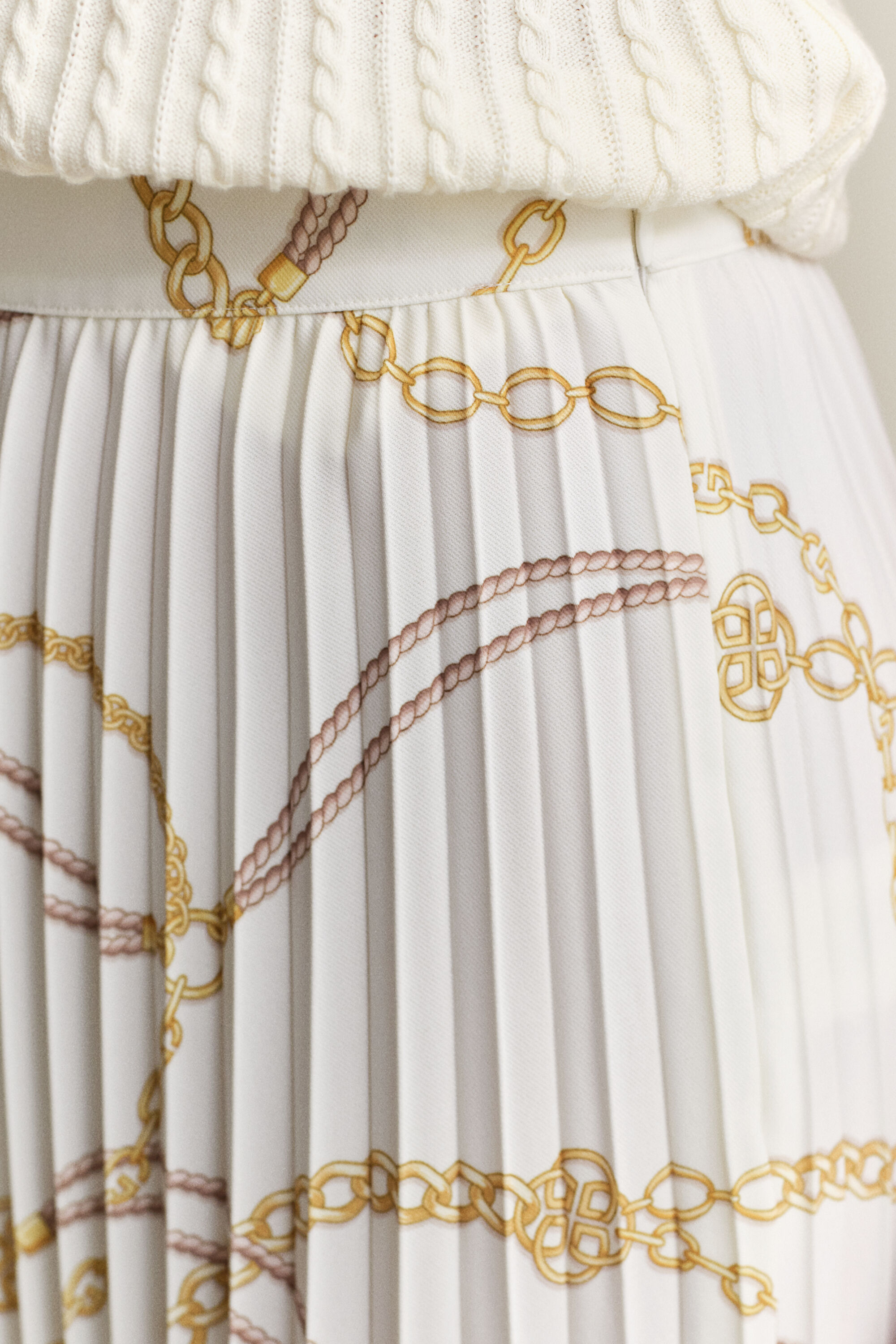 Plisserad kjol med tryck