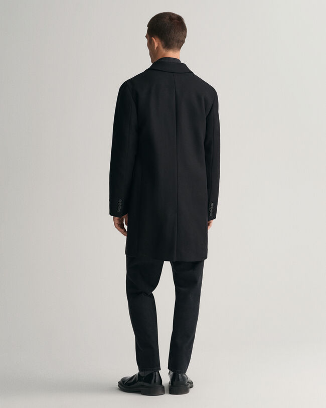 Klassisk figursydd ytterrock i ull