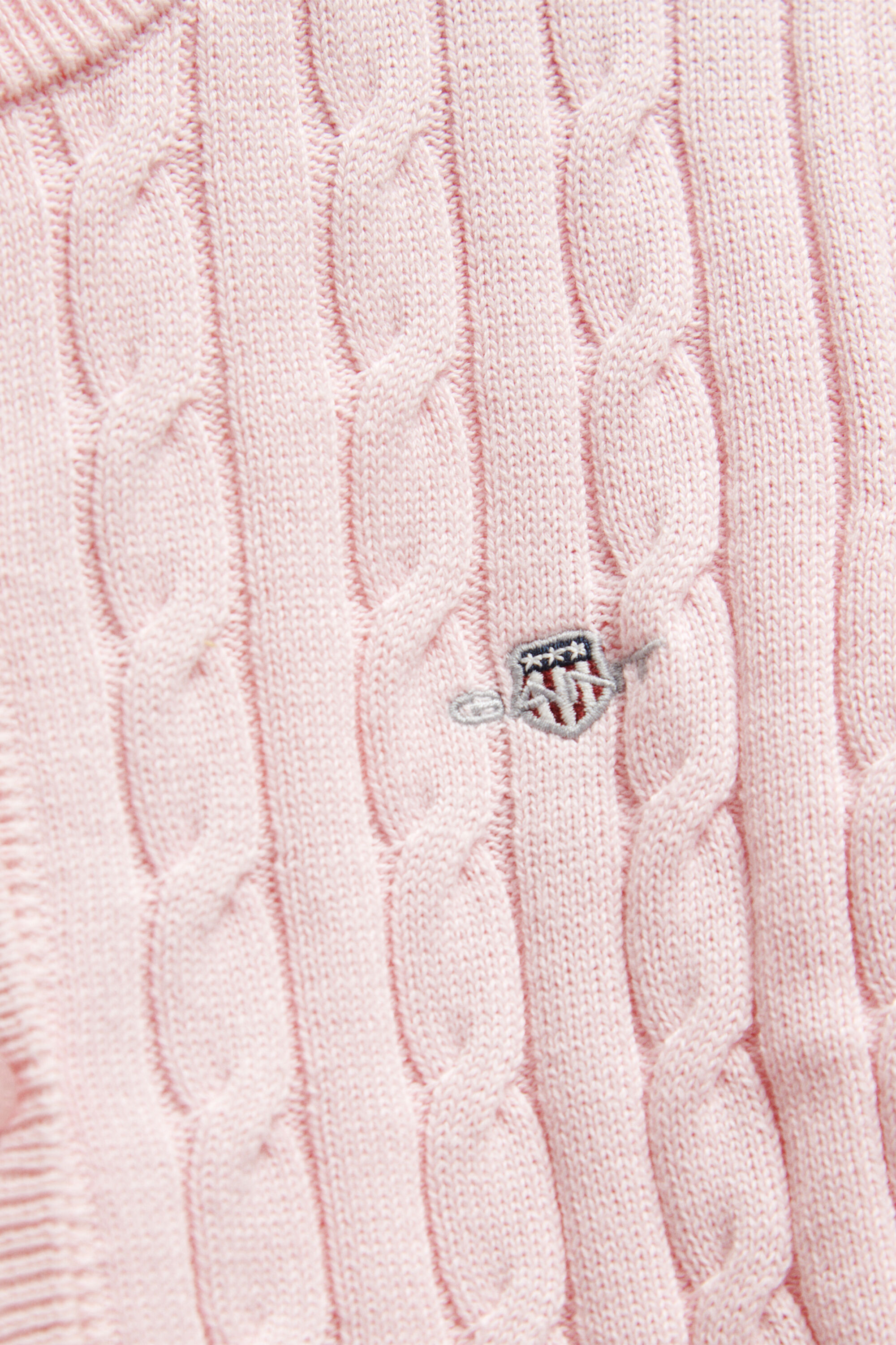Girls kabelstickad kofta med sköldemblem