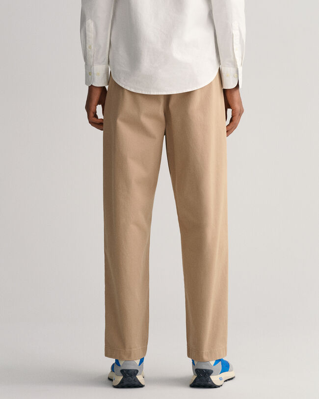 Relaxed fit chinos med veck