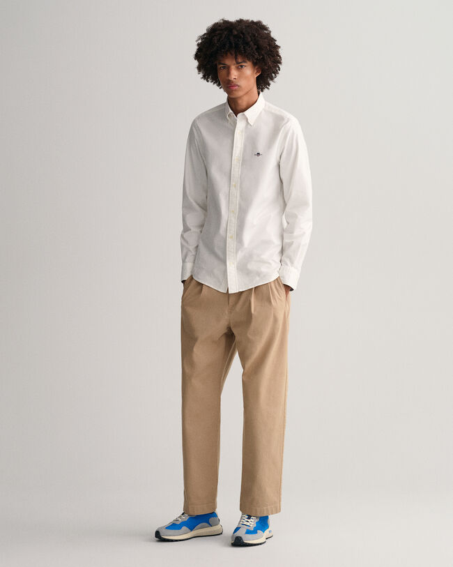 Relaxed fit chinos med veck
