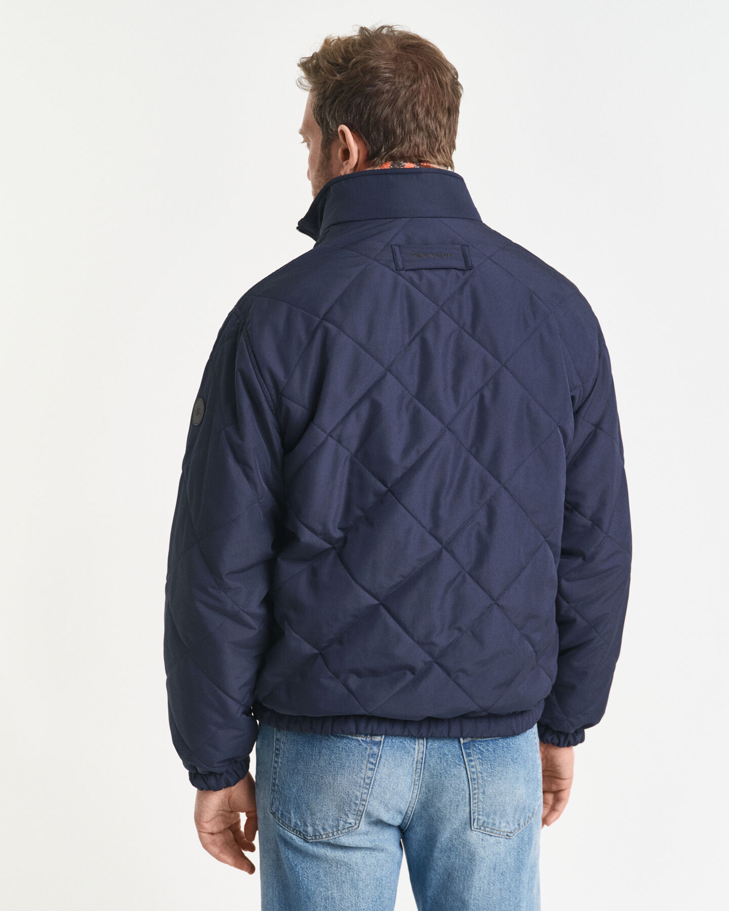 Vändbar jacka med ståkrage