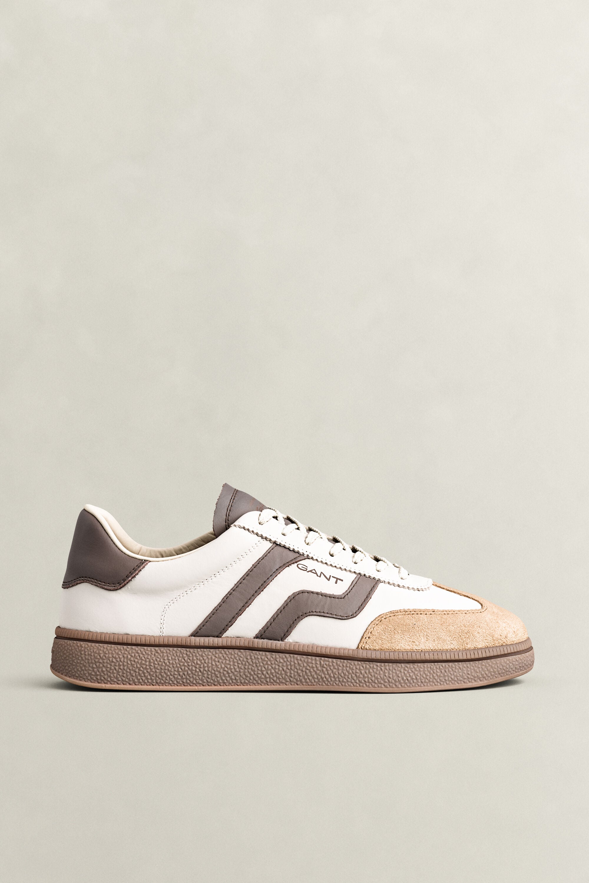 Cuzmo sneakers i läder och mocka