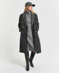 Klänning med polokrage och stickade detaljer