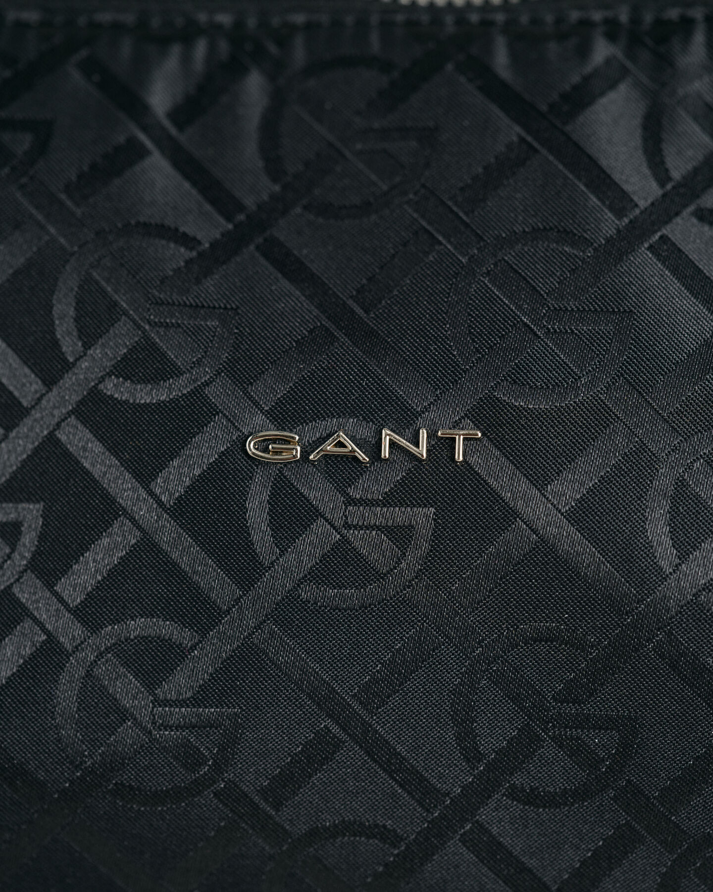 G-mönstrad axelväska