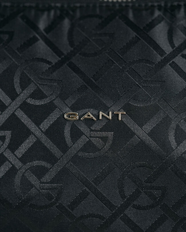 G-mönstrad axelväska