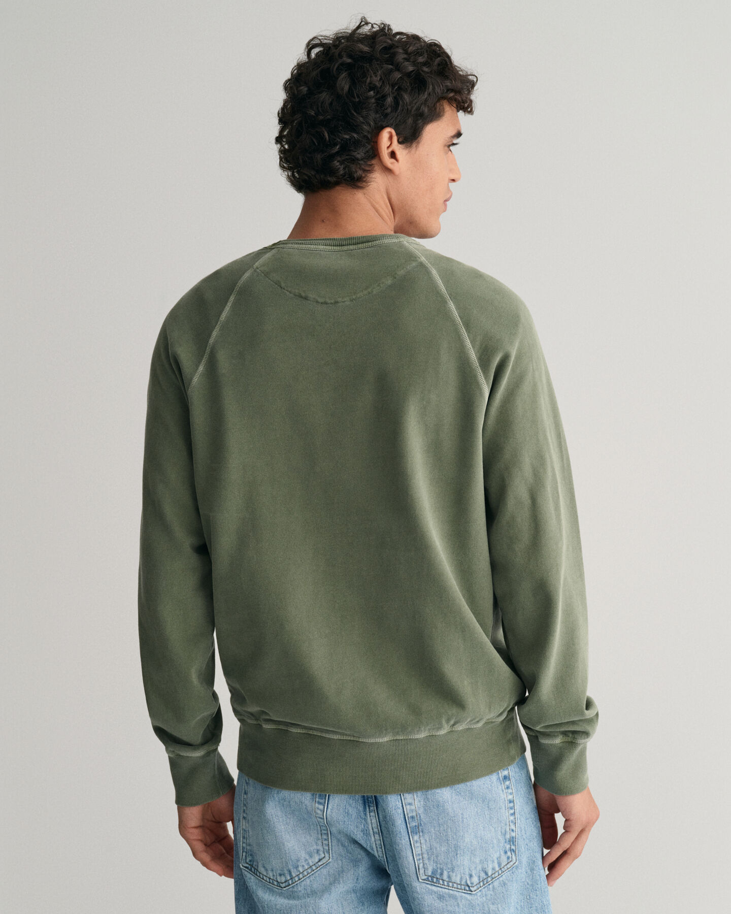 Sunfaded rundhalsad sweatshirt