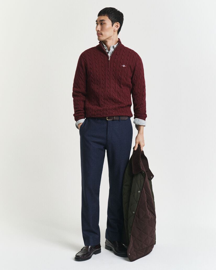 Kabelstickad bomullströja med dragkedja vid halsöppningen