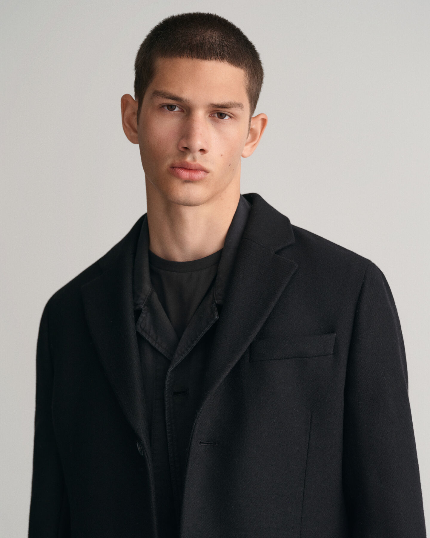 Klassisk figursydd ytterrock i ull