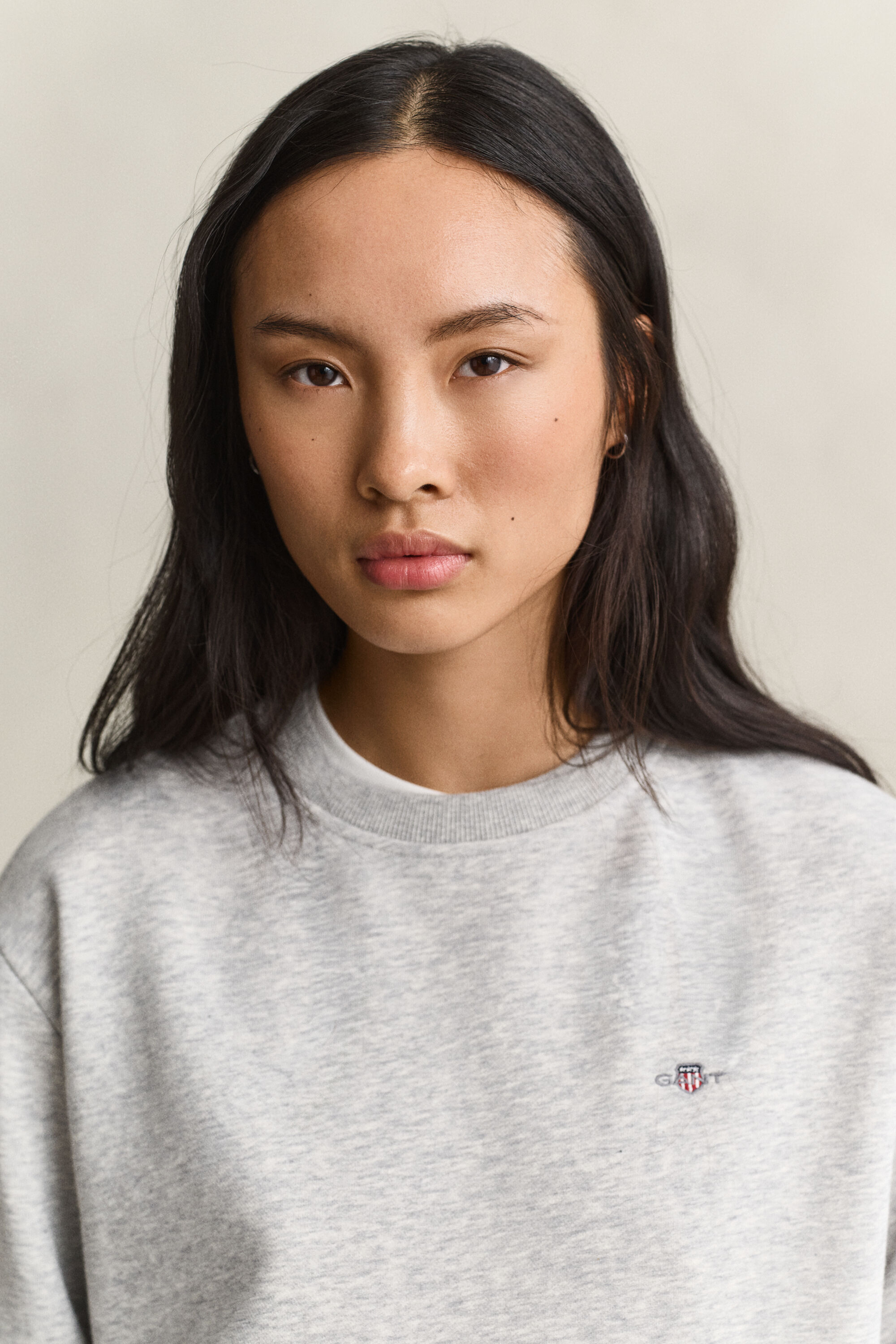 Sweatshirt med sköldemblem