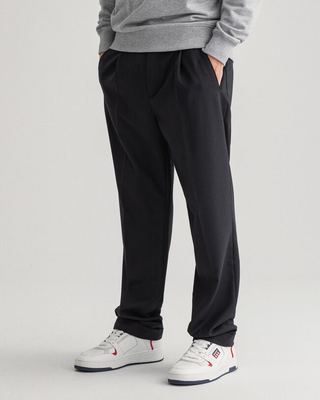 Fluid byxor med veck