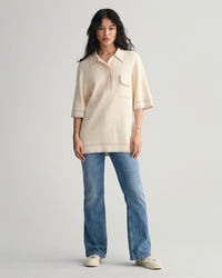 Stickad pik&eacute;tr&ouml;ja med kort &auml;rm