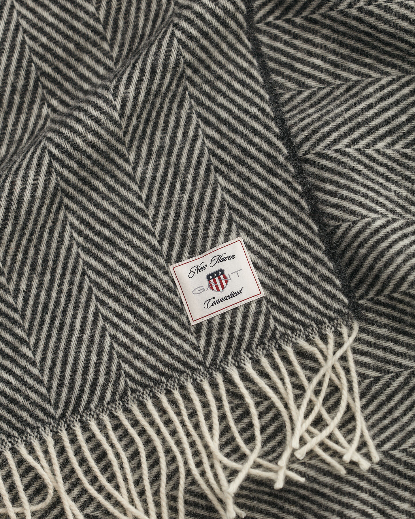 Fiskbensmönstrad yllepläd