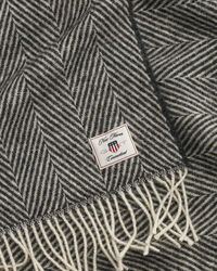 Fiskbensmönstrad yllepläd