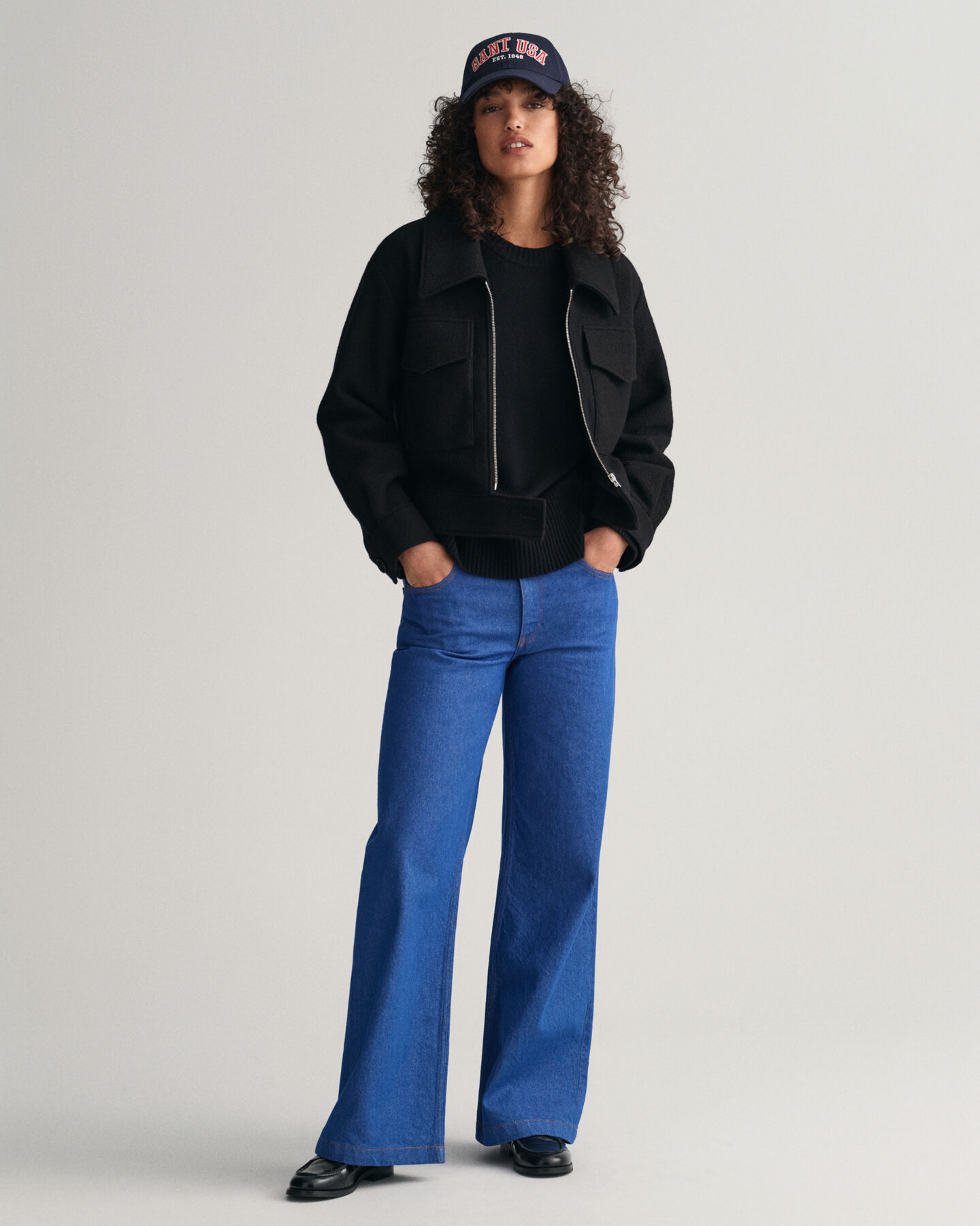 Jacka i boucl&eacute; med dragkedja