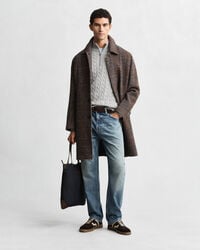 Kabelstickad bomullströja med dragkedja vid halsöppningen