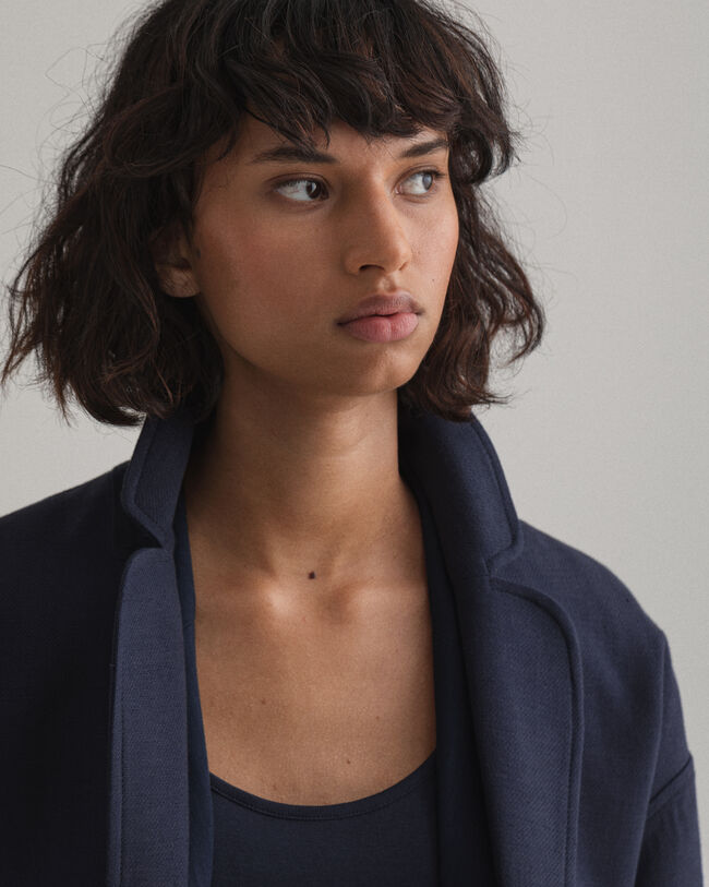 Fluid kappa i linneblandning med b&auml;lte